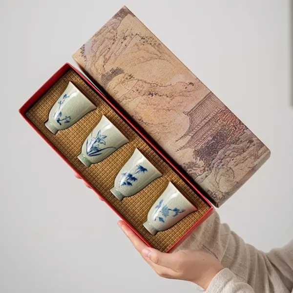 كوب شاي سيراميك صيني فاخر – تصميم زهرة الأوركيد، البامبو، الكريزانتيموم، والخوخ | مجموعة شاي فنية أصيلة للمطبخ والضيافة