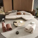 ⁦أريكة فاخرة منحنية بتصميم فني أنيق⁩ - الصورة ⁦4⁩