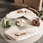 أريكة فاخرة منحنية بتصميم فني أنيق