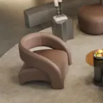 ⁦أريكة بيضاء منحنية بتصميم نوردي⁩ - الصورة ⁦7⁩