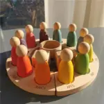دمى خشبية تعليمية بألوان قوس قزح
